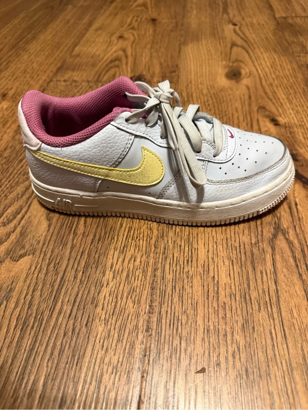 Nike Kids White Sneakers with Yellow Swoosh and Pink Lining